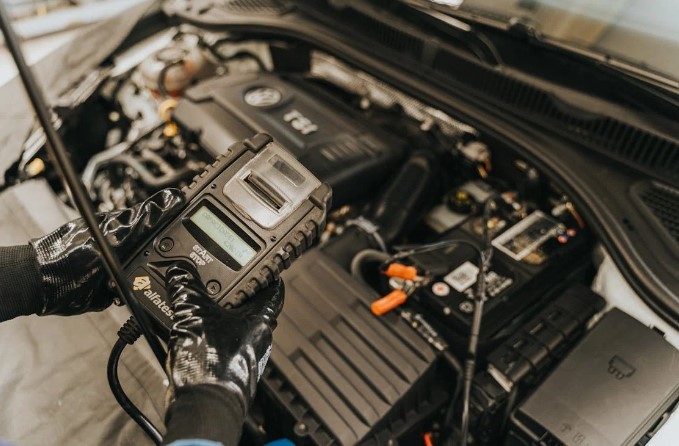 mechanic repairing car