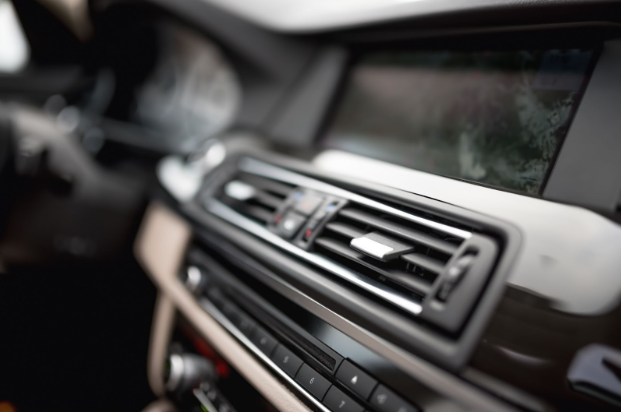 A close-up view of a car's air conditioning vents