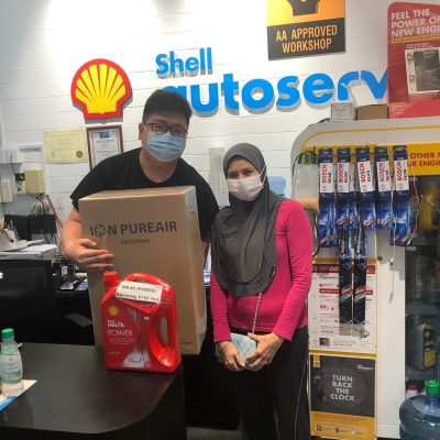 a woman with shell helix power engine oil